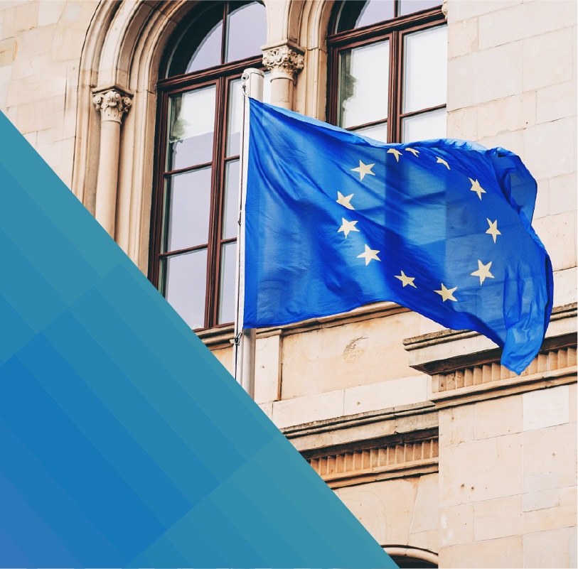 EU flag flying in front of a government building